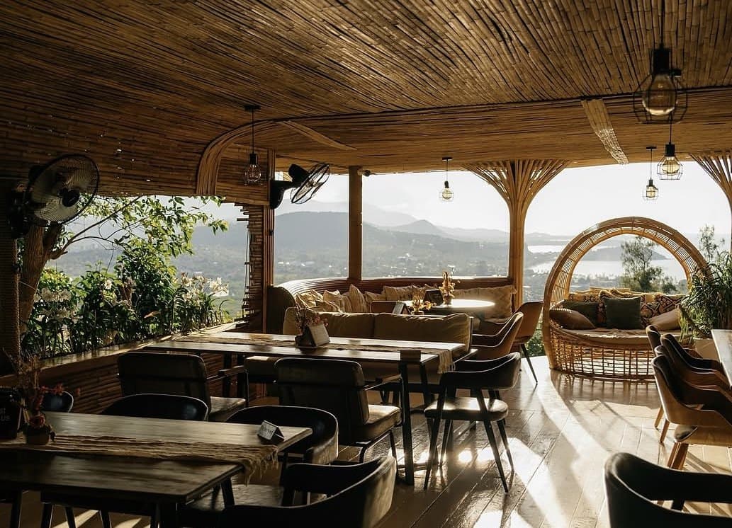 Cocoon’s woven interior with a coastal view